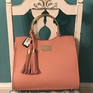 Bebe Handbag for sale. NWT